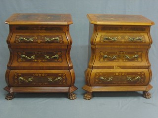 A pair of Dutch style inlaid marquetry bedside chests of bombe form, fitted 3 long drawers on claw supports 20"