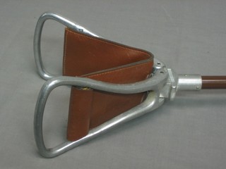 A metal framed shooting stick