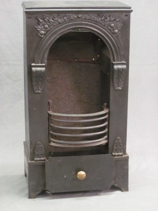 A Victorian cast iron stove grate 16"