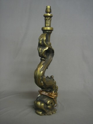 A Continental gilt metal table lamp in the form of a dolphin 22"