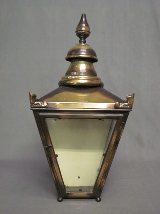 A waisted metal and glass lamp housing 12"