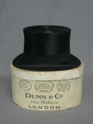 A black top hat, size 7 1/4 by Dunns 