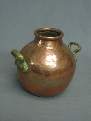 A planished copper twin handled vase 9"