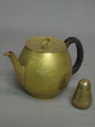 A Benares brass teapot together with a pepperette