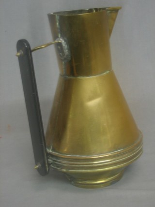 A Dresser style brass jug with ebony handle 10"