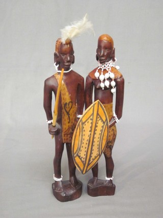 A pair of African figures of standing warriors, 11"