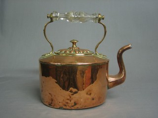 A Victorian oval copper kettle with brass handle