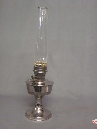 A chrome oil lamp