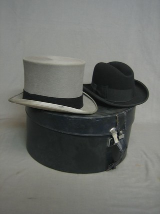 A gentleman's grey top hat by Lincoln Bennett size 7, together with a Homburg contained in a plastic hat box size 6 7/8