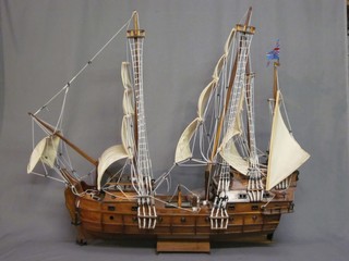 A handsome "rosewood" model of a 3 masted sailing ship 39"