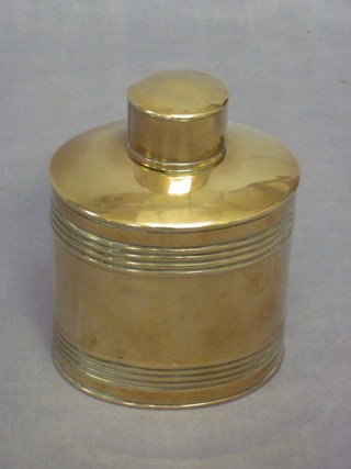 An oval brass caddy, the base marked 42 JM 4"