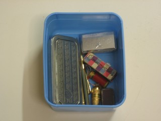 A lady's travelling razor, a Rolls razor, a needle case, a tape measure and 3 gilt metal propelling pencils