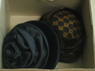 A lady's brown velvet and Cheetah pattern hat by Henderson and a black velvet and silk hat