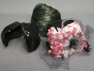 A lady's black clasp style fascinator, a green feather fascinator and a black velvet fascinator with net veil