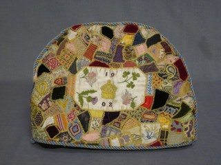 A patchwork tea cosy to commemorate the 1902 Coronation of Edward VII