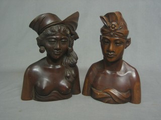A pair of Eastern carved portrait busts - lady and gentleman 11"