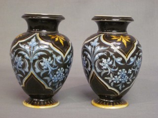 A pair of Doulton Lambeth club shaped vases, base marked Doulton Lambeth, incised 1883 7"