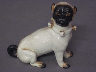 A 19th Century Continental porcelain figure of a seated Pug 4"