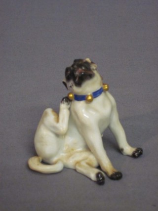 A Meissen figure of a seated scratching Pug, the base with crossed swords mark and impressed 78773 2"