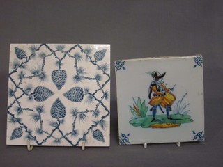 A Delft style pottery tile 5" together with a 19th Century blue and white pottery tile
