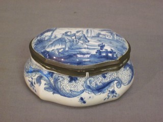 An 18th/19th Century shaped Delft blue and white trinket box with hinged lid and gilt mounts, the base marked CA 3 1/2" (cracked)