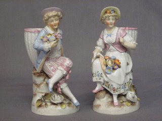 A matched pair of 19th Century Continental porcelain spill vases in the form of seated lady and gentleman with panniers, 6"