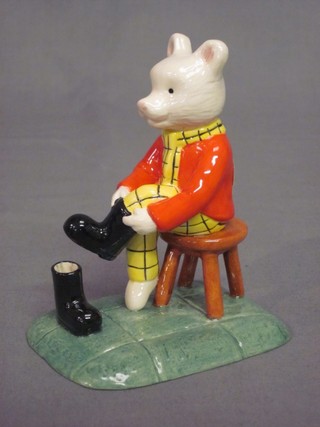 A Royal Doulton figure of Rupert Bear with Wellingtons - Out For the Day