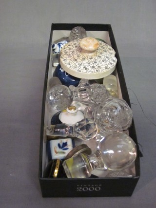 A collection of various glass bottle stoppers etc