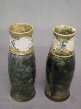 A pair of Royal Doulton green salt glazed club shaped vases, the base marked RD and incised CW (1 chip to lid) 8"