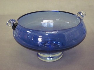 A blue glass twin handled bowl 8"
