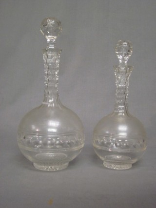 2 cut glass mallet shaped decanters