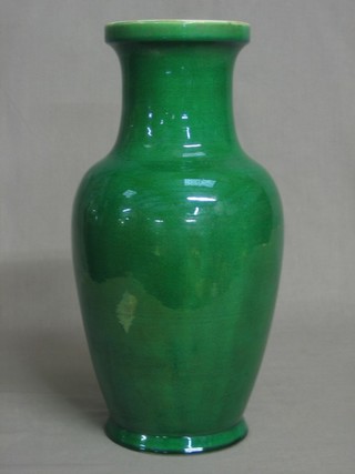 An Oriental green glazed club shaped vase (drilled for a table lamp) 13"