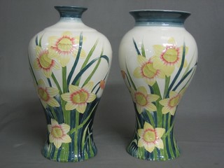 2 similar pottery vases decorated stylised daffodils 15"