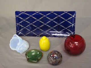 A rectangular blue glass dish 13", a small red glass bowl, an opaque glass scalloped shaped dish, do. bubble shaped glass dish and 2 paperweights