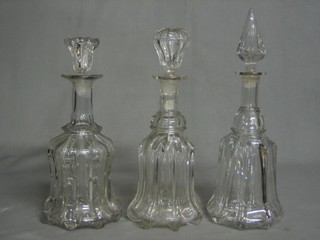 3 19th Century mallet shaped decanters and stoppers