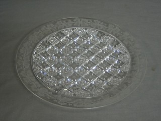 A circular etched and glass platter 13"