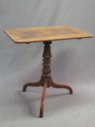 A  rectangular mahogany snap top tea table, raised on a pillar and tripod base 27"