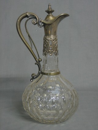 A handsome Victorian cut glass claret jug with plated mounts