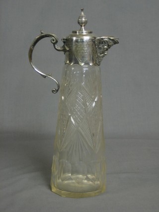 An Edwardian cut glass claret jug with silver plated mounts