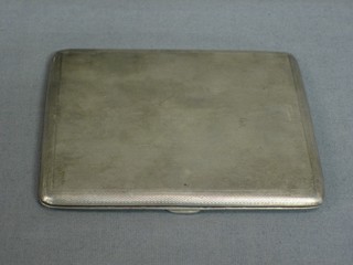 A silver cigarette case with engine turned decoration Birmingham 1936 3 ozs