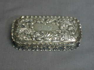 An Edwardian rectangular embossed silver box with hinged lid Chester 1901 1 ozs