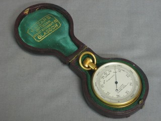 A pocket barometer by J Lizars of Glasgow contained in a leather carrying case