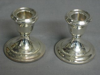 A pair of modern silver stub shaped candlesticks, Birmingham 2"