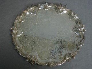 A 19th Century shaped silver plated salver with bracketed border 10"