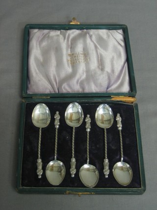 A set of 6 silver apostle coffee spoons, Birmingham 1901, cased