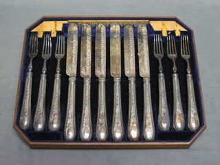 A set of 6 Victorian silver bladed fruit knives and forks, Sheffield 1868