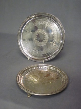 A circular engraved silver plated salver, raised on 3 panelled feet 10" and 1 other 8 1/2" 
