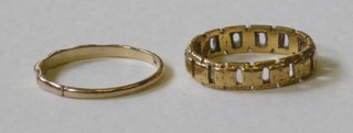 A lady's 9ct gold wedding band and 1 other pierced gold wedding band