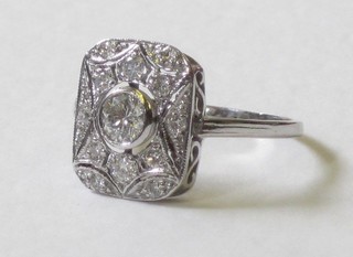 An 18ct white gold Art Deco style pierced dress ring set diamonds approx 0.65ct
