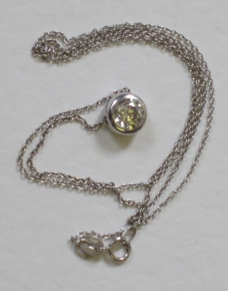 An 18ct white gold fine chain hung a circular cut diamond approx 0.70ct